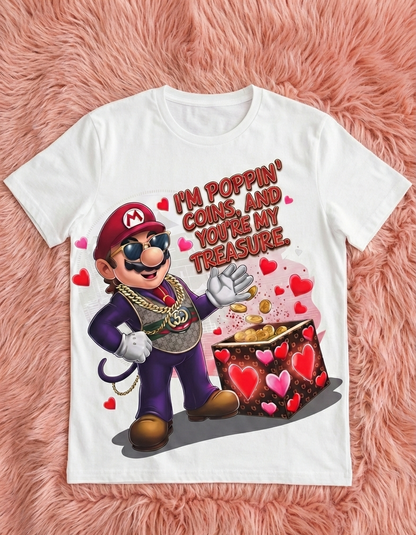 White t-shirt with a character holding a treasure chest and hearts on a pink fluffy background