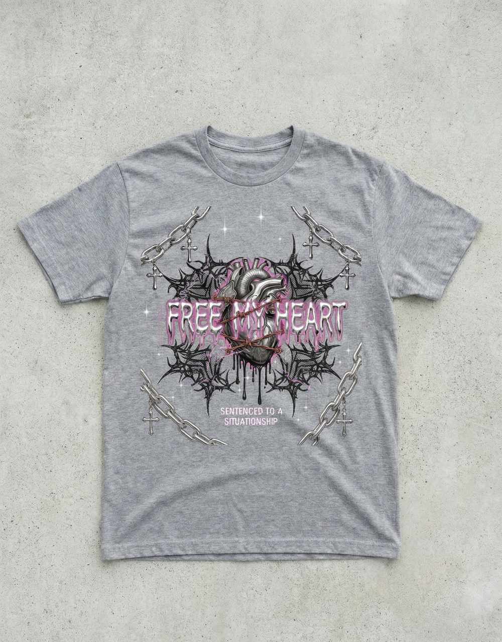 Gray t-shirt with a graphic design on a concrete surface