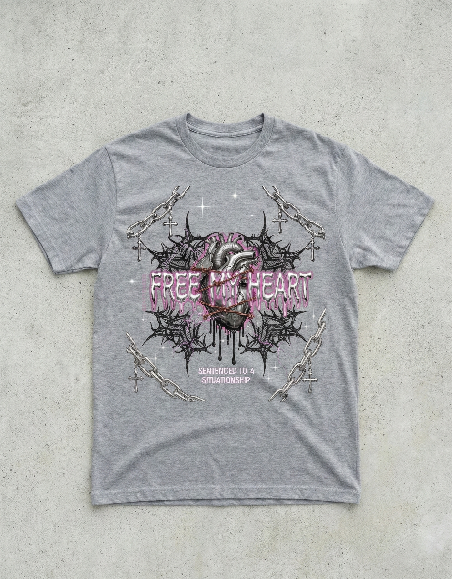 Gray t-shirt with a graphic design on a concrete surface