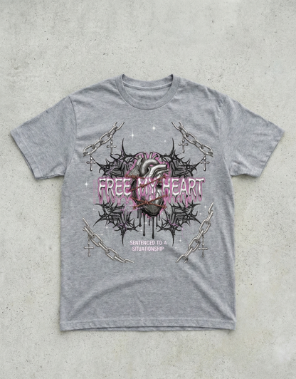 Gray t-shirt with a graphic design on a concrete surface