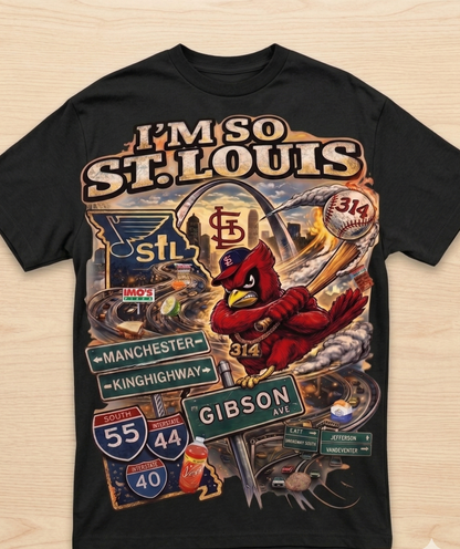 Black t-shirt with 'I'm So St. Louis' graphic design featuring a cardinal and city elements on a wooden surface.