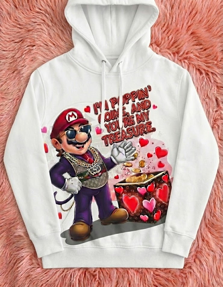 White hoodie with a character design and text on a pink fluffy background